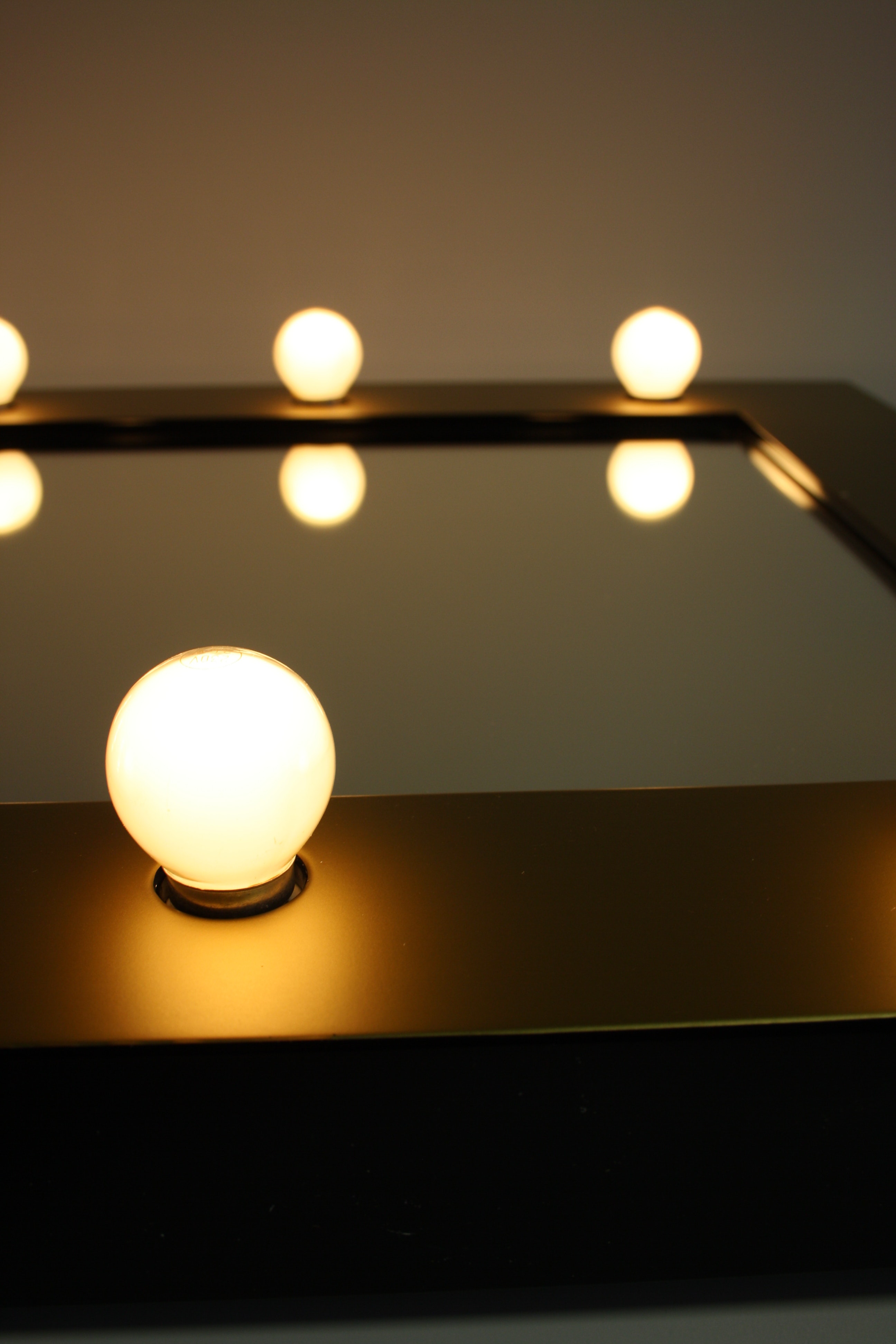 lightbulbs on mirror